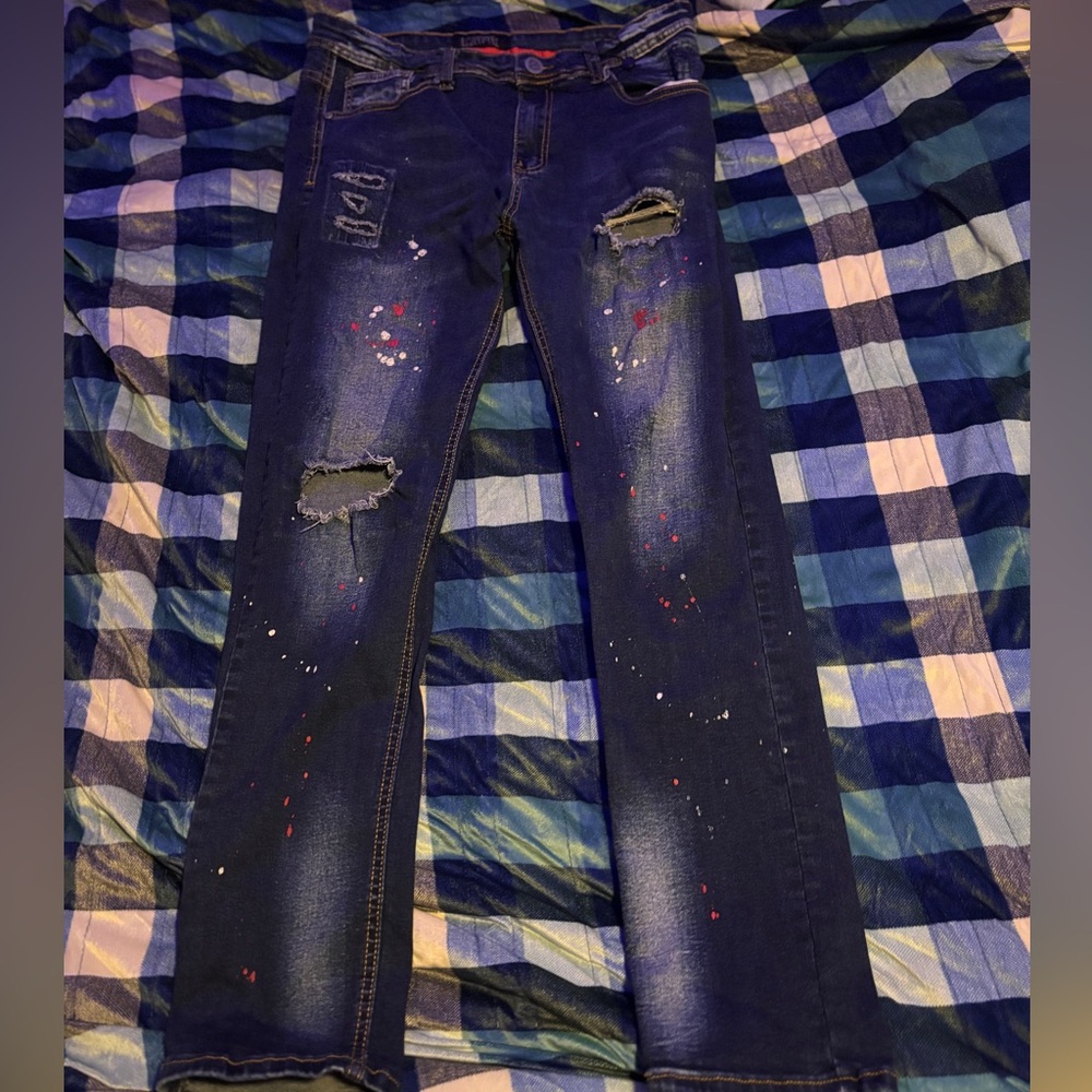 Dark Blue Red And White scattered paint Distressed Blue Jeans